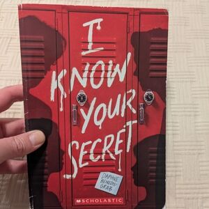 Scholastic Red Book with Bold White Text